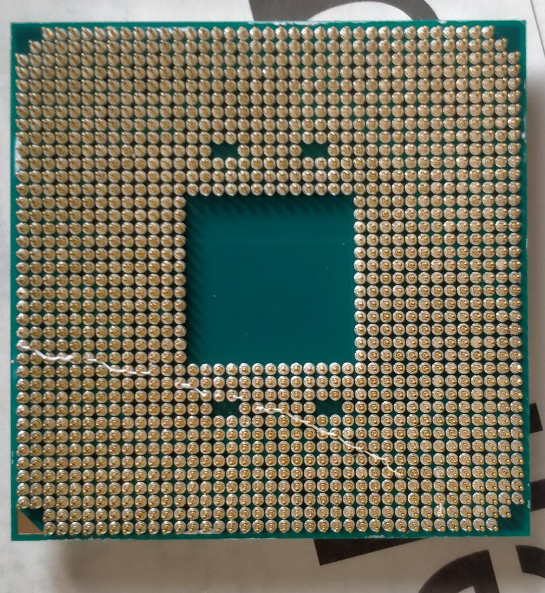 Got Thermal Paste On CPU Pins